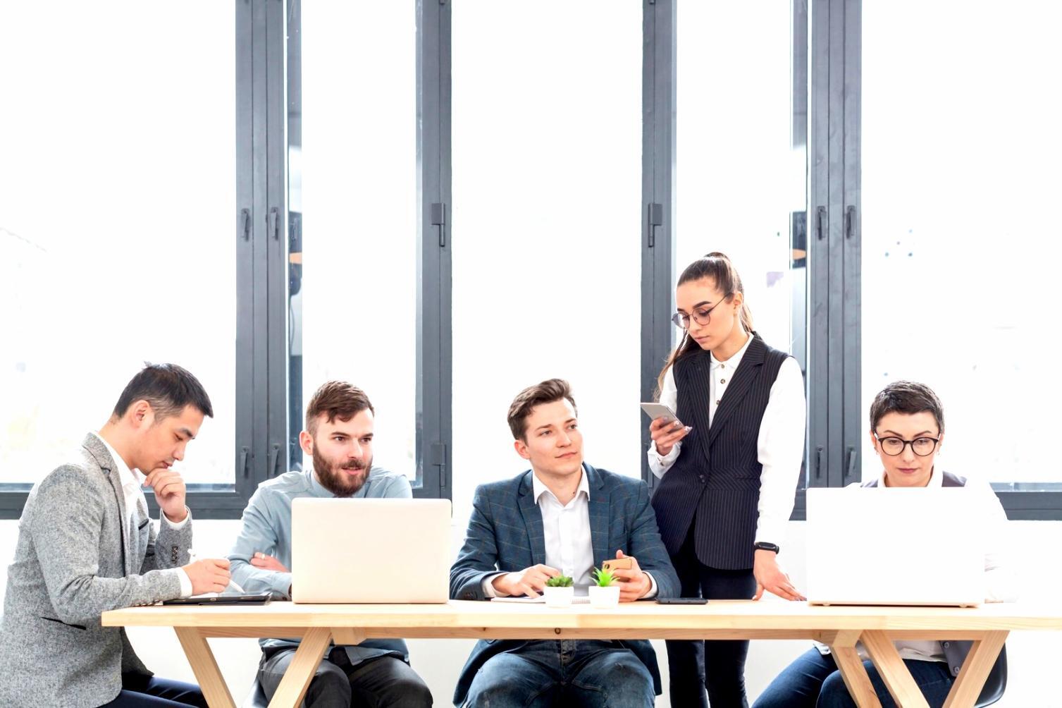 Investment learning materials and resources spread on a desk